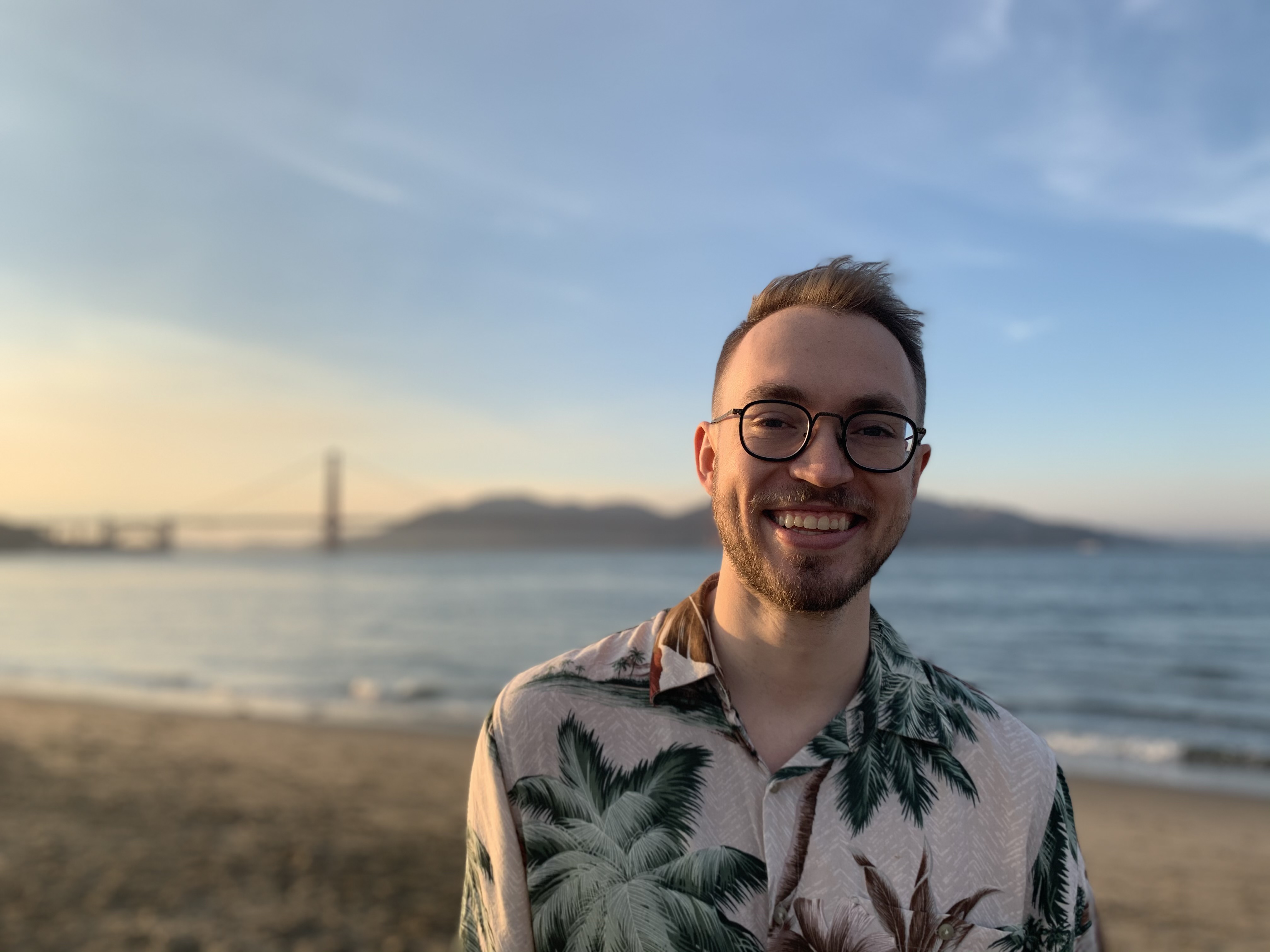 Gus Schmidt by the water at sunset